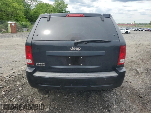 2007 Jeep Grand Cherokee Laredo z VIN 1J8GR48K47C681735, wystawiony jako Copart lot #59006435 z przebiegiem 195 517 mil mil oraz Nie do naprawy • Non repairable. Historia ofert i sprzedaży dostępna na DreamBid. Obrazek 6.