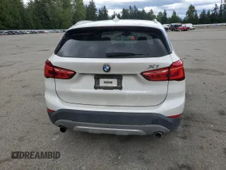 2016 BMW X1 xDrive28i z VIN WBXHT3C30G5E54396, wystawiony jako Copart lot #56042815 z przebiegiem 101 632 mil mil oraz Szkoda całkowita • Salvage title. Historia ofert i sprzedaży dostępna na DreamBid. Obrazek 6.