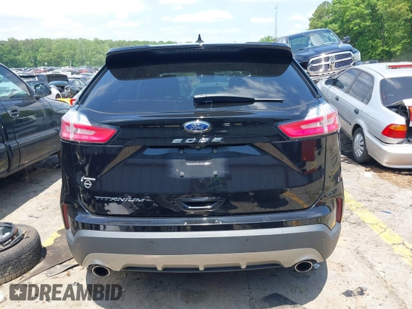 2021 Ford Edge Titanium z VIN 2FMPK3K96MBA16046, wystawiony jako IAAI lot #42137419 z przebiegiem 88 622 mil mil oraz . Historia ofert i sprzedaży dostępna na DreamBid. Obrazek 16.