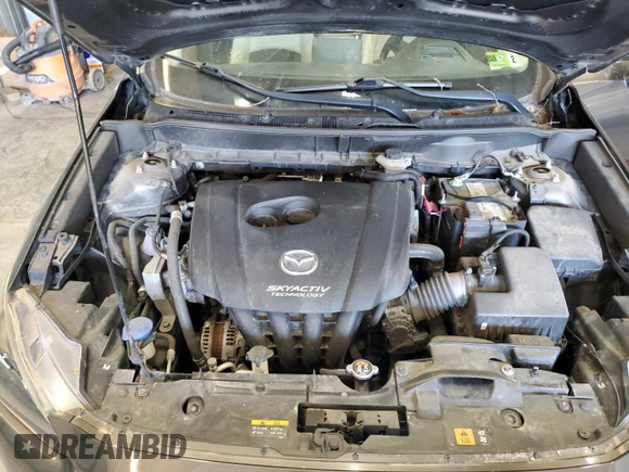 2016 Mazda CX-3 Grand Touring z VIN JM1DKFD74G0137815, wystawiony jako Copart lot #52405765 z przebiegiem 128 922 mil mil oraz Szkoda całkowita • Salvage title. Historia ofert i sprzedaży dostępna na DreamBid. Obrazek 11.