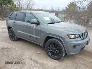 2020 Jeep Grand Cherokee Altitude with VIN 1C4RJFAGXLC148002, listed as a IAAI auction lot 41968918 with 130,377 mi miles. Bid and sale history available at carsss.com. Image 1.