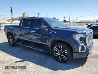 2022 GMC Sierra 1500 Denali with VIN 3GTU9FEDXNG213711, listed as a Copart auction lot 64112245 with 63,476 mi miles and Salvage title. Bid and sale history available at DreamBid. Image 4.