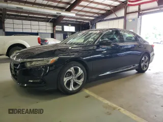 2018 Honda Accord EX-L z VIN 1HGCV1F59JA144831, wystawiony jako Copart lot #61353175 z przebiegiem 288 817 mil mil oraz Czysty tytuł • Clean title. Historia ofert i sprzedaży dostępna na DreamBid. Obrazek 1.