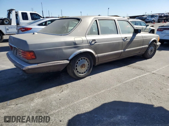 1989 Mercedes-Benz 560 with VIN WDBCA39D7KA428953, listed as a Copart auction lot 80856634 with 243,871 mi miles and Clean Title. Bid and sale history available at DreamBid. Image 3.