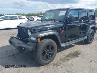 2023 Jeep Wrangler Willys with VIN 1C4HJXDN1PW634763, listed as a IAAI auction lot 41689202 with 23,369 mi miles and . Bid and sale history available at DreamBid. Image 17.