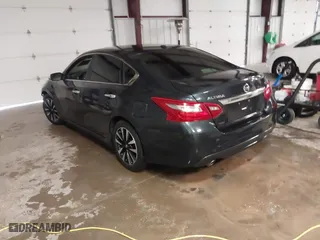2018 Nissan Altima 2.5 SV with VIN 1N4AL3AP1JC276024, listed as a IAAI auction lot 41271383 with 121,088 mi miles. Bid and sale history available at carsss.com. Image 3.