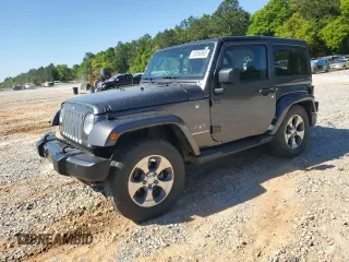 2017 Jeep Wrangler Sahara z VIN 1C4AJWBG1HL669600, wystawiony jako Copart lot #52856865 z przebiegiem 85 311 mil mil oraz Szkoda całkowita • Salvage title. Historia ofert i sprzedaży dostępna na DreamBid. Obrazek 1.