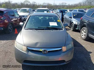 2006 Honda Civic Sdn LX with VIN 1HGFA16516L060197, listed as a IAAI auction lot 41855242 with 204,499 mi miles. Bid and sale history available at carsss.com. Image 6.