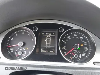2014 Volkswagen CC Sport with VIN WVWBN7AN0EE527558, listed as a IAAI auction lot 41336204 with 130,005 mi miles and . Bid and sale history available at DreamBid. Image 7.