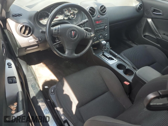 2007 Pontiac G6 GT with VIN 1G2ZH18NX74127920, listed as a Copart auction lot 52950365 with 127,428 mi miles and Salvage title. Bid and sale history available at DreamBid. Image 8.