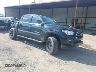 2016 Toyota Tacoma SR5 z VIN 5TFAZ5CN9GX014947, wystawiony jako IAAI lot #42125167 z przebiegiem 137 564 mil mil oraz . Historia ofert i sprzedaży dostępna na DreamBid. Obrazek 1.