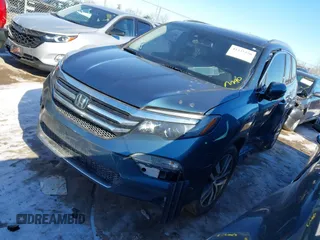 2016 Honda Pilot Elite with VIN 5FNYF6H04GB060786, listed as a IAAI auction lot 41335550 with 152,863 mi miles. Bid and sale history available at carsss.com. Image 17.