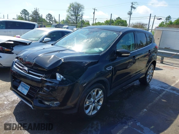 2013 Ford Escape SEL with VIN 1FMCU9H94DUA10002, listed as a IAAI auction lot 41963247 with 85,941 mi miles. Bid and sale history available at carsss.com. Image 18.