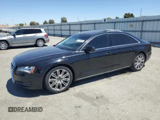 2014 Audi A8 3.0T с VIN WAURGAFD5EN005771, выставлен на аукционе Copart как лот 63796305 с пробегом 116 713 миль миль и Списание • Salvage title. История ставок и продаж доступна на DreamBid. Изображение 1.