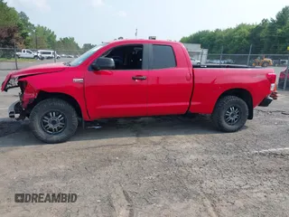 2012 Toyota Tundra z VIN 5TFUY5F16CX231794, wystawiony jako IAAI lot #42454478 z przebiegiem 249 756 mil mil oraz . Historia ofert i sprzedaży dostępna na DreamBid. Obrazek 14.