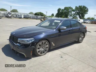 2019 BMW 5 Series M550i xDrive with VIN WBAJB9C5XKB287877, listed as a Copart auction lot 52994065 with 52,460 mi miles and Salvage title. Bid and sale history available at DreamBid. Image 1.