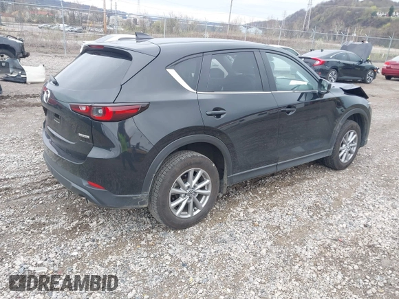 2023 Mazda CX-5 S Carbon Edition z VIN JM3KFBCM9P0130796, wystawiony jako IAAI lot #41956104 z przebiegiem 21 796 mil mil oraz . Historia ofert i sprzedaży dostępna na DreamBid. Obrazek 4.