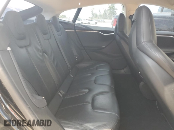 2013 Tesla Model S z VIN 5YJSA1DN6DFP20864, wystawiony jako Copart lot #66708325 z przebiegiem 179 928 mil mil oraz Czysty tytuł • Clean title. Historia ofert i sprzedaży dostępna na DreamBid. Obrazek 10.