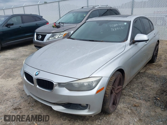 2014 BMW 3 Series 328i with VIN WBA3A5G52ENP31318, listed as a IAAI auction lot 42801411 with 149,355 mi miles and . Bid and sale history available at DreamBid. Image 22.