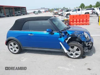 2006 MINI Convertible S with VIN WMWRH335X6TK59110, listed as a IAAI auction lot 42089085 with 101,303 mi miles and . Bid and sale history available at DreamBid. Image 13.