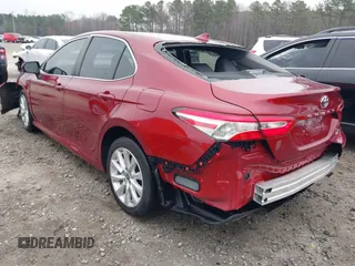 2020 Toyota Camry LE with VIN 4T1C11AK1LU359477, listed as a IAAI auction lot 41800546 with 109,319 mi miles and . Bid and sale history available at DreamBid. Image 3.