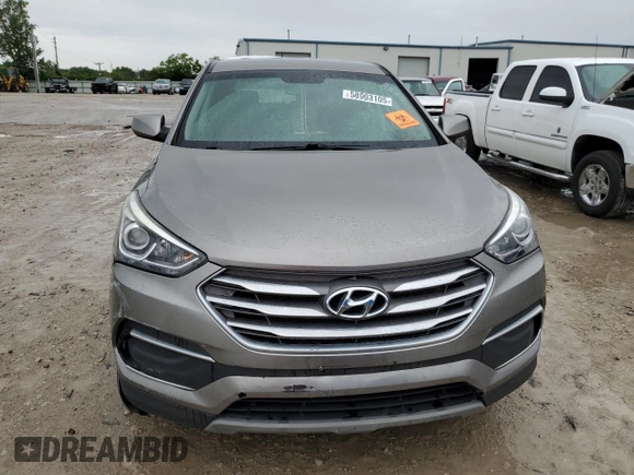 2018 Hyundai Santa Fe 2.4L z VIN 5NMZTDLB0JH087449, wystawiony jako Copart lot #58903105 z przebiegiem 114 037 mil mil oraz Szkoda całkowita • Salvage title. Historia ofert i sprzedaży dostępna na DreamBid. Obrazek 5.