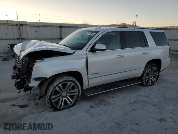 2019 GMC Yukon Denali with VIN 1GKS2CKJ9KR119887, listed as a Copart auction lot 83589544 with 86,754 mi miles and Salvage Title. Bid and sale history available at carsss.com. Image 1.