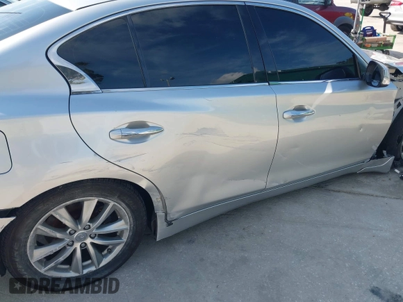 2014 Infiniti Q50 with VIN JN1BV7AP4EM677506, listed as a IAAI auction lot 40113207 with 142,446 mi miles and . Bid and sale history available at DreamBid. Image 14.