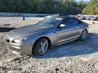 2014 BMW 6 Series 640i with VIN WBALW7C55EDX58778, listed as a Copart auction lot 77047654 with 62,383 mi miles and Salvage Title. Bid and sale history available at carsss.com. Image 1.