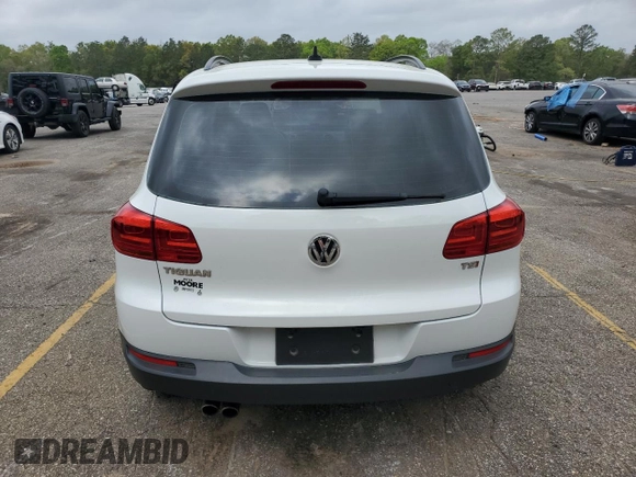 2017 Volkswagen Tiguan S with VIN WVGAV7AX0HK021419, listed as a Copart auction lot 51510935 with 97,084 mi miles and Salvage Title. Bid and sale history available at DreamBid. Image 6.