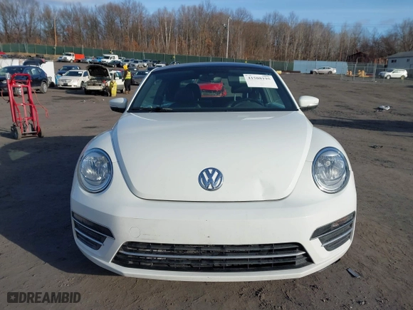 2019 Volkswagen Beetle SE with VIN 3VWJD7AT6KM713525, listed as a IAAI auction lot 41508195 with 73,360 mi miles. Bid and sale history available at carsss.com. Image 12.