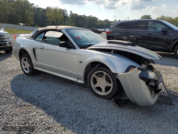 2000 Ford Mustang GT with VIN 1FAFP45X7YF133856, listed as a Copart auction lot 74099834 with NaN miles and Salvage Title. Bid and sale history available at carsss.com. Image 4.