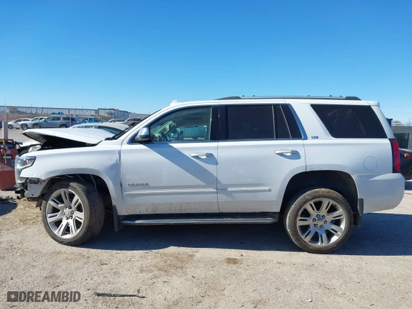 2016 Chevrolet Tahoe LTZ with VIN 1GNSKCKCXGR341155, listed as a IAAI auction lot 41244868 with 163,455 mi miles. Bid and sale history available at carsss.com. Image 13.