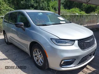 2024 Chrysler Pacifica Touring L with VIN 2C4RC1BG1RR129222, listed as a IAAI auction lot 42552555 with 56,755 mi miles and . Bid and sale history available at DreamBid. Image 1.