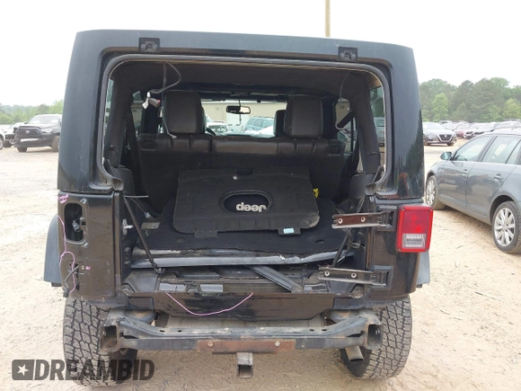 2015 Jeep Wrangler Unlimited Rubicon with VIN 1C4BJWFG7FL688728, listed as a IAAI auction lot 42054304 with 100,152 mi miles and . Bid and sale history available at DreamBid. Image 16.