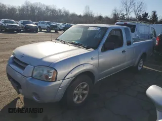 2001 Nissan Frontier XE z VIN 1N6DD26SX1C401806, wystawiony jako Copart lot #49397345 z przebiegiem 231 002 mil mil oraz Czysty tytuł • Clean title. Historia ofert i sprzedaży dostępna na DreamBid. Obrazek 1.