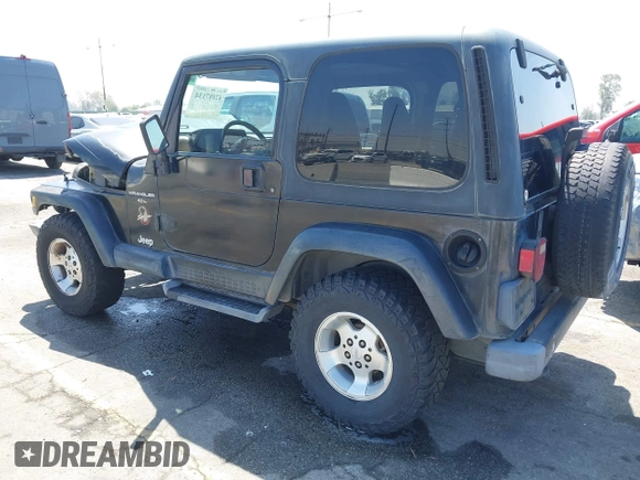 2001 Jeep Wrangler Sahara with VIN 1J4FA59SX1P337951, listed as a IAAI auction lot 42087134 with 154,479 mi miles and . Bid and sale history available at DreamBid. Image 3.