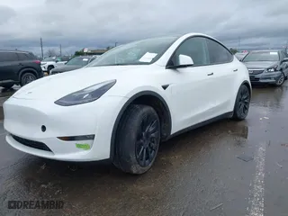 2023 Tesla Model Y Long Range with VIN 7SAYGDEE5PF753922, listed as a IAAI auction lot 41529511 with 50,731 mi miles. Bid and sale history available at carsss.com. Image 17.