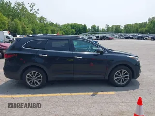 2017 Hyundai Santa Fe SE z VIN KM8SMDHF1HU213391, wystawiony jako IAAI lot #42415929 z przebiegiem 202 056 mil mil oraz . Historia ofert i sprzedaży dostępna na DreamBid. Obrazek 13.