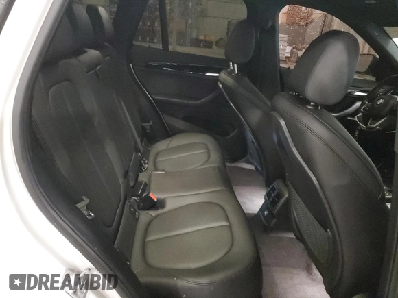 2018 BMW X1 xDrive28i with VIN WBXHT3C30J5K29917, listed as a Copart auction lot 56165845 with 131,876 mi miles and Salvage title. Bid and sale history available at DreamBid. Image 11.