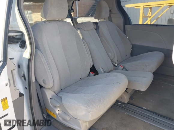 2014 Toyota Sienna LE AAS with VIN 5TDKK3DC2ES483679, listed as a IAAI auction lot 41547261 with 142,697 mi miles. Bid and sale history available at carsss.com. Image 8.