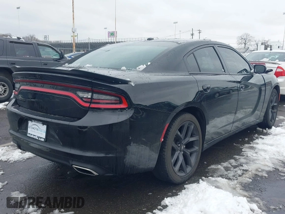 2022 Dodge Charger SXT with VIN 2C3CDXBG0NH157720, listed as a IAAI auction lot 41559731 with 21,062 mi miles and . Bid and sale history available at carsss.com. Image 4.