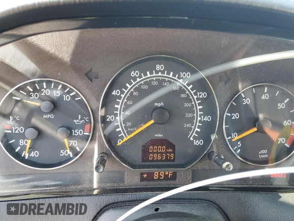 1999 Mercedes-Benz SL-Class with VIN WDBFA68F1XF184891, listed as a Copart auction lot 77082284 with 96,379 mi miles and Salvage Title. Bid and sale history available at carsss.com. Image 9.