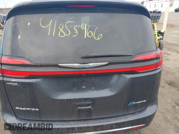 2021 Chrysler Pacifica Hybrid Touring L z VIN 2C4RC1L7XMR593987, wystawiony jako IAAI lot #41855966 z przebiegiem 72 685 mil mil oraz . Historia ofert i sprzedaży dostępna na DreamBid. Obrazek 16.