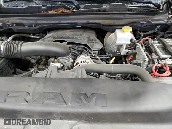 2021 Ram 1500 Big Horn z VIN 1C6RREFT7MN708516, wystawiony jako Copart lot #57719405 z przebiegiem 65 000 mil mil oraz Szkoda całkowita • Salvage title. Historia ofert i sprzedaży dostępna na DreamBid. Obrazek 11.