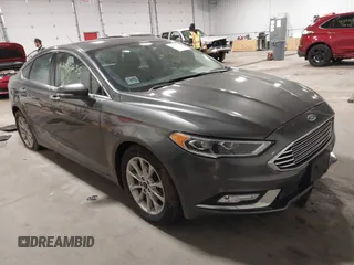 2017 Ford Fusion SE z VIN 3FA6P0HD6HR252690, wystawiony jako IAAI lot #42115235 z przebiegiem 187 418 mil mil oraz . Historia ofert i sprzedaży dostępna na DreamBid. Obrazek 1.