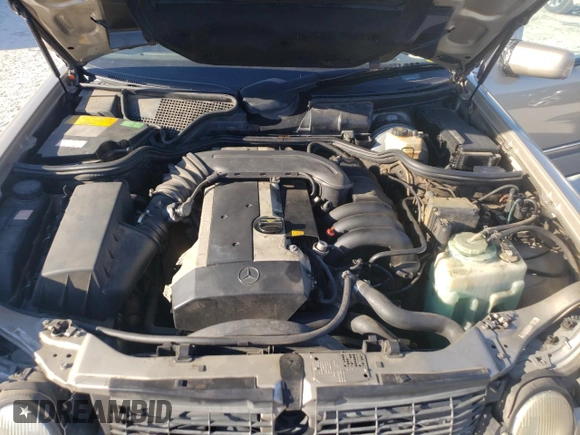 1996 Mercedes-Benz E-Class with VIN WDBJF55F7TJ022765, listed as a Copart auction lot 70577504 with 186,340 mi miles and Salvage Title. Bid and sale history available at carsss.com. Image 11.