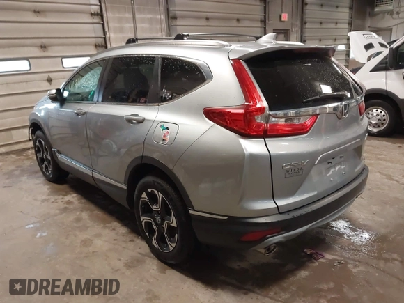 2017 Honda CR-V Touring with VIN 5J6RW2H95HL042012, listed as a IAAI auction lot 41911028 with 93,575 mi miles. Bid and sale history available at carsss.com. Image 3.