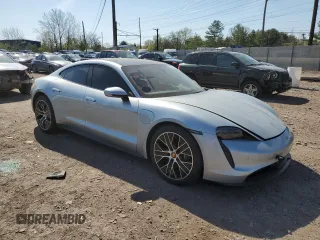 2022 Porsche Taycan z VIN WP0AA2Y19NSA15847, wystawiony jako Copart lot #54012535 z przebiegiem 28 002 mil mil oraz Szkody całkowita. Historia ofert i sprzedaży dostępna na DreamBid. Obrazek 4.