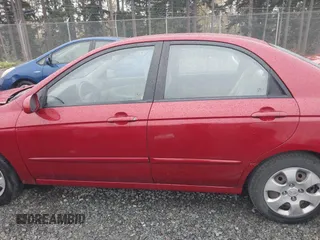 2009 Kia Spectra EX with VIN KNAFE222695621925, listed as a IAAI auction lot 40657622 with 135,647 mi miles. Bid and sale history available at carsss.com. Image 14.